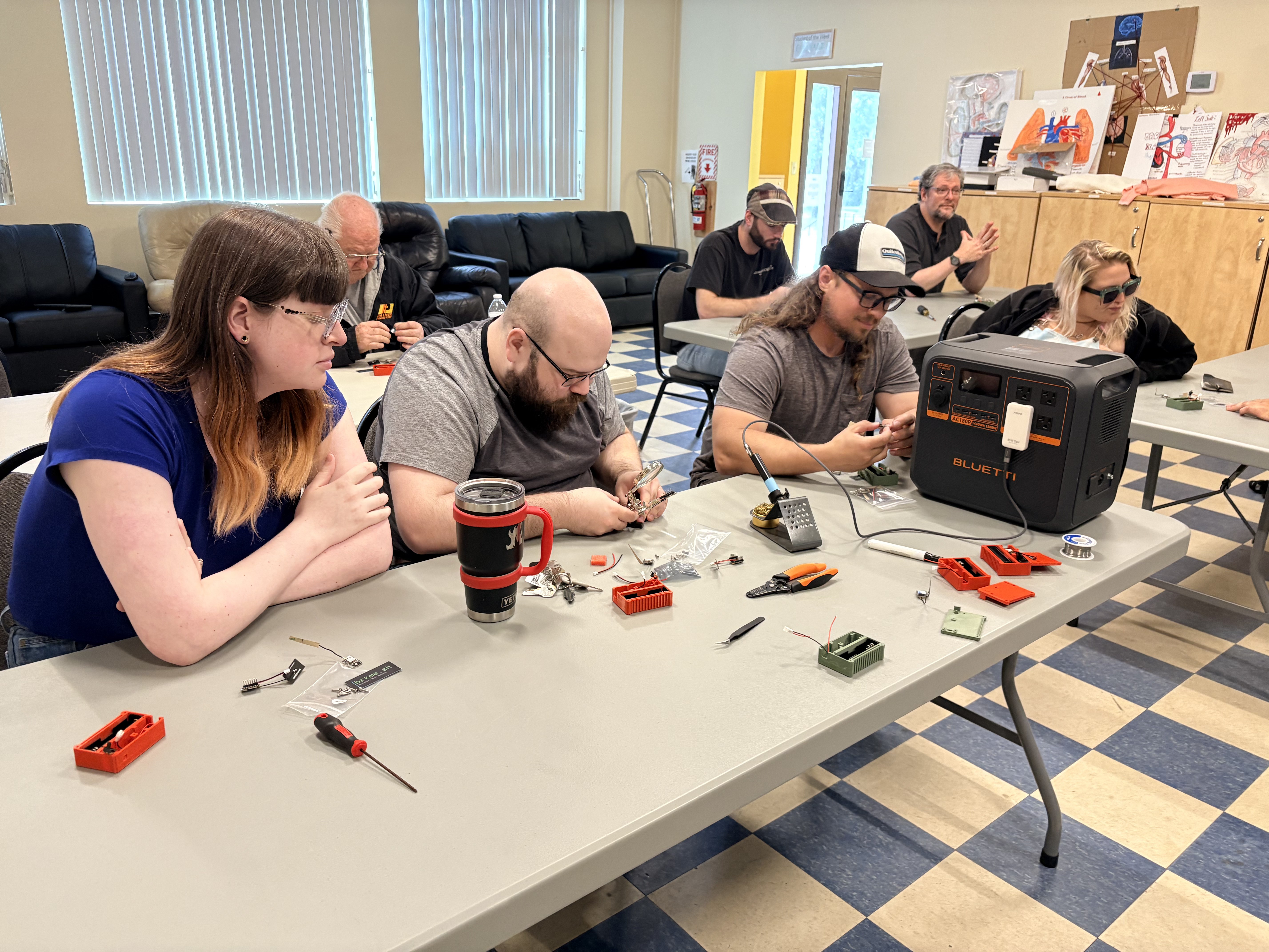 Attendees working on assembling their nodes